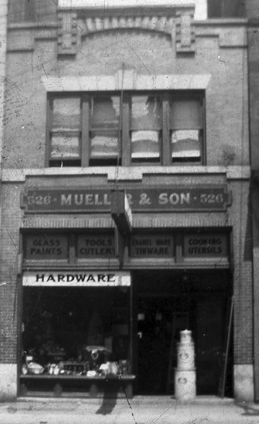 Black and white image of Mueller's Hardware storefront in 1926.
